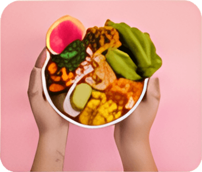 Duas mãos segurando um bowl colorido de legumes e folhas